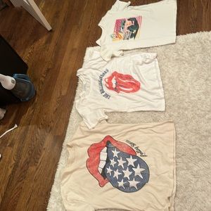 Two Rolling Stone shirts, one bronco